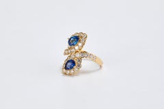 Van Cleef & Arpels Gold Ring with 2 Pear Natural Blue Sapphires and Diamonds