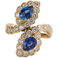 Retro Van Cleef & Arpels Gold Ring with 2 Pear Natural Blue Sapphires and Diamonds