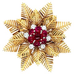 Van Cleef & Arpels Brosche aus Gold mit Rubin und Diamanten