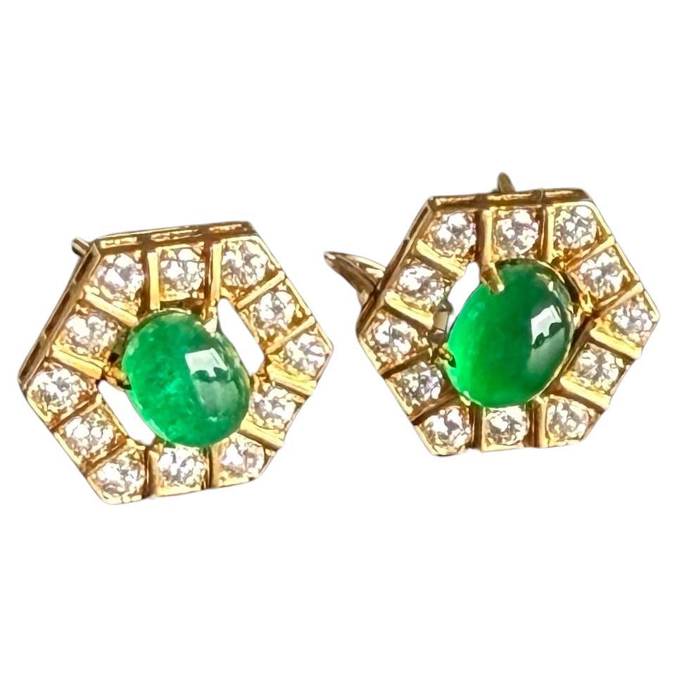 Van Cleef & Arpels
Diamond & Green Emerald Cabochon Earrings
18k Yellow Gold Post Backs with Lever Backs
#3k28XX   Circa 1970's
2 cashon emerald 3.28 carats
24 Round Diamonds 1.28 Carats
Total 4.56 cts 
Comes with VCA Storage pouch and COA 
Dated