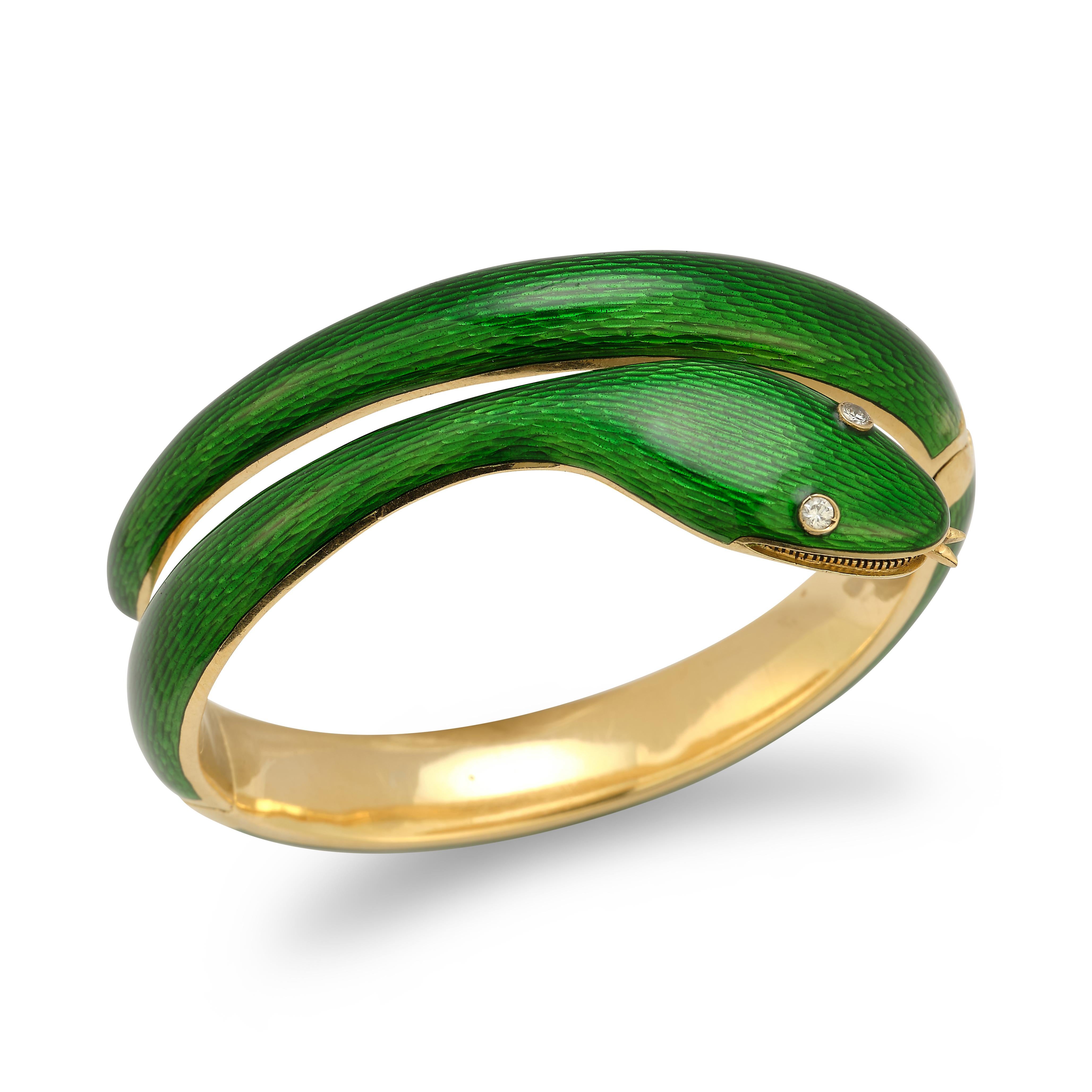 Van Cleef & Arpels Green Enamel Snake Serpenti Bangle

All green enamel bangle & 2 round cut diamonds as snakes eyes set in 18k yellow gold.

Measurements: 2.25