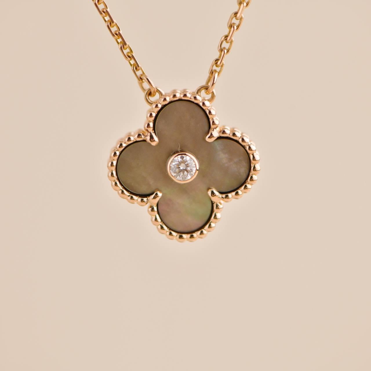 Van Cleef & Arpels Grey Mother of Pearl 18k Rose Gold 2014 Holiday Pendant In Excellent Condition In Banbury, GB