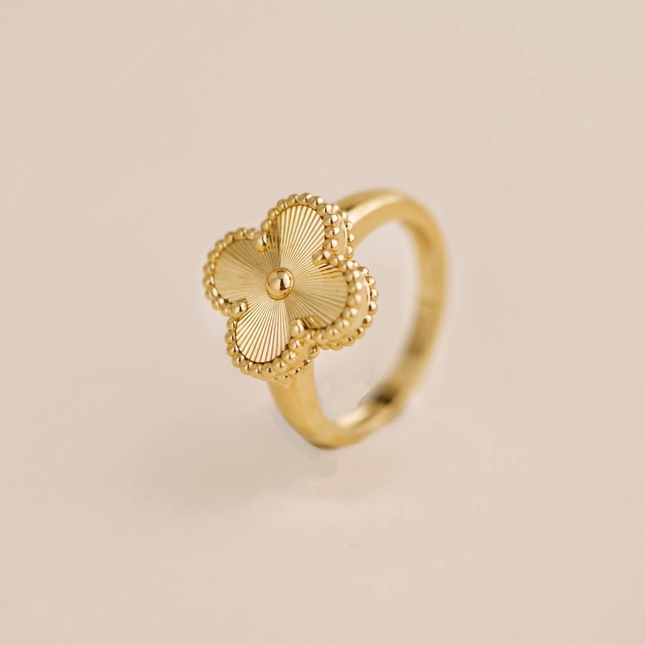 Van Cleef & Arpels Guilloché Alhambra 18k Yellow Gold Ring Size 54 In Excellent Condition For Sale In Banbury, GB