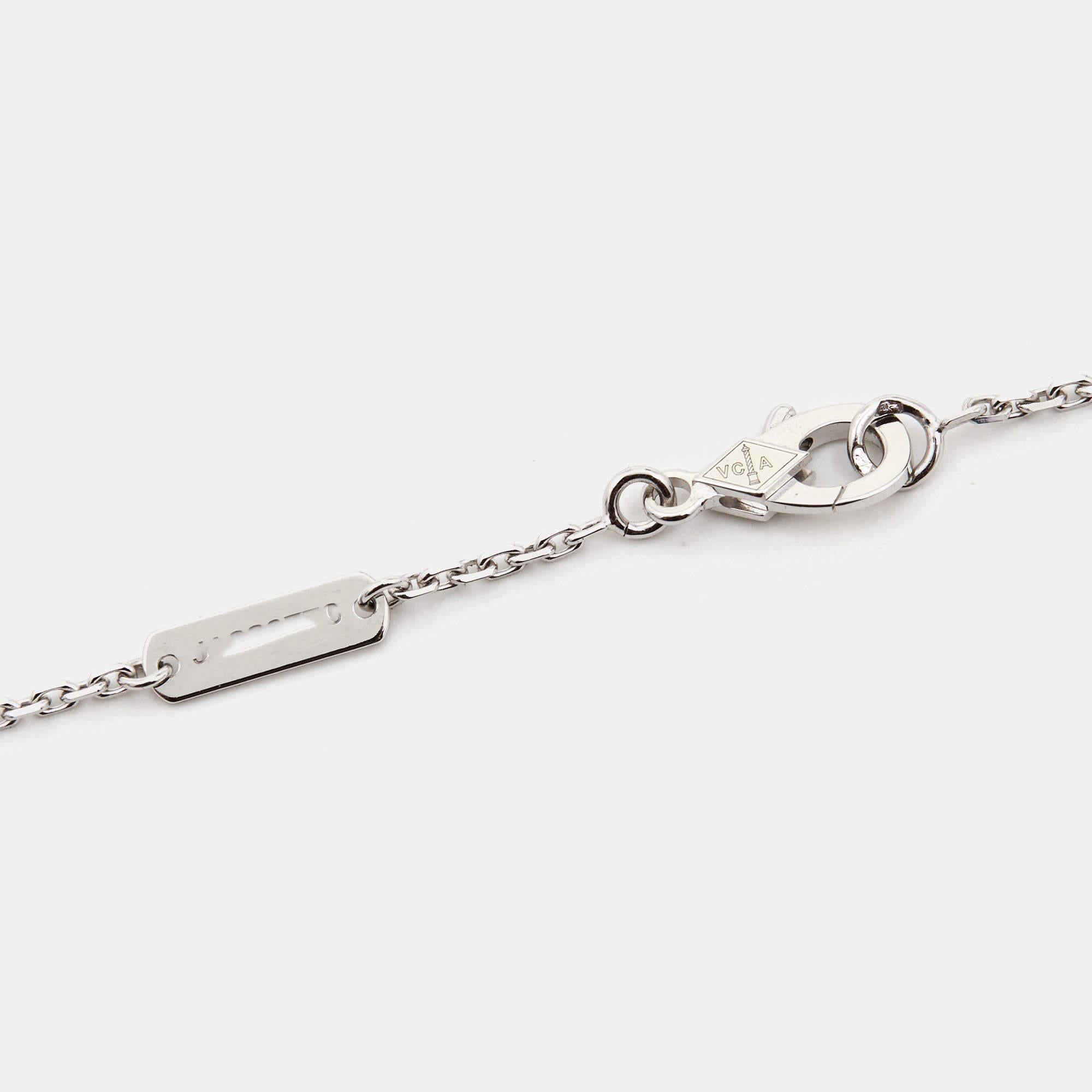 The Van Cleef & Arpels Vintage Alhambra necklace is an exquisite piece of jewelry crafted in 18k white gold. It features the iconic Alhambra quatrefoil motif adorned with delicate guilloché engraving and a dazzling diamond, creating a timeless and