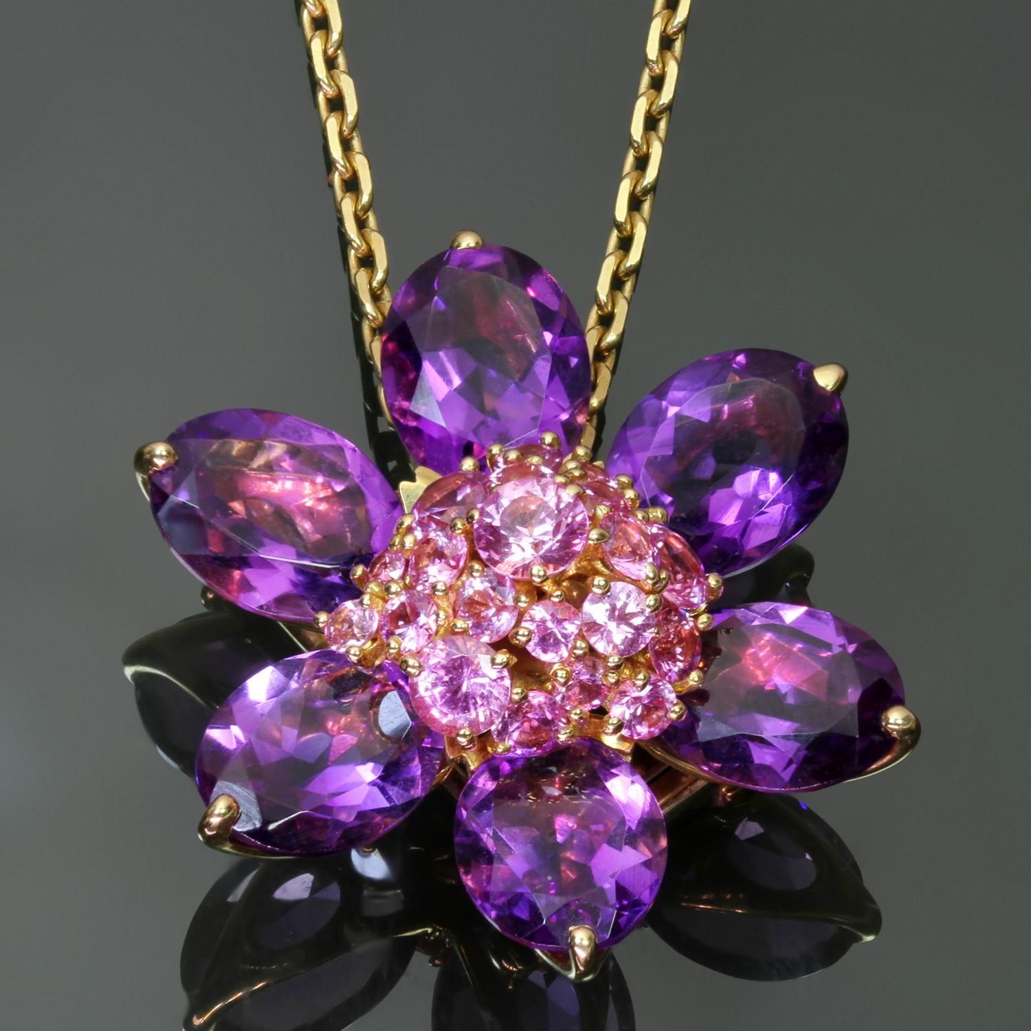 This stunning Van Cleef & Arpels brooch/pendant necklace from the vibrant Hawaii collection is crafted in 18k yellow gold and features a five-petal flower composed of faceted amethysts and a cluster of faceted pink sapphires. Made in France circa