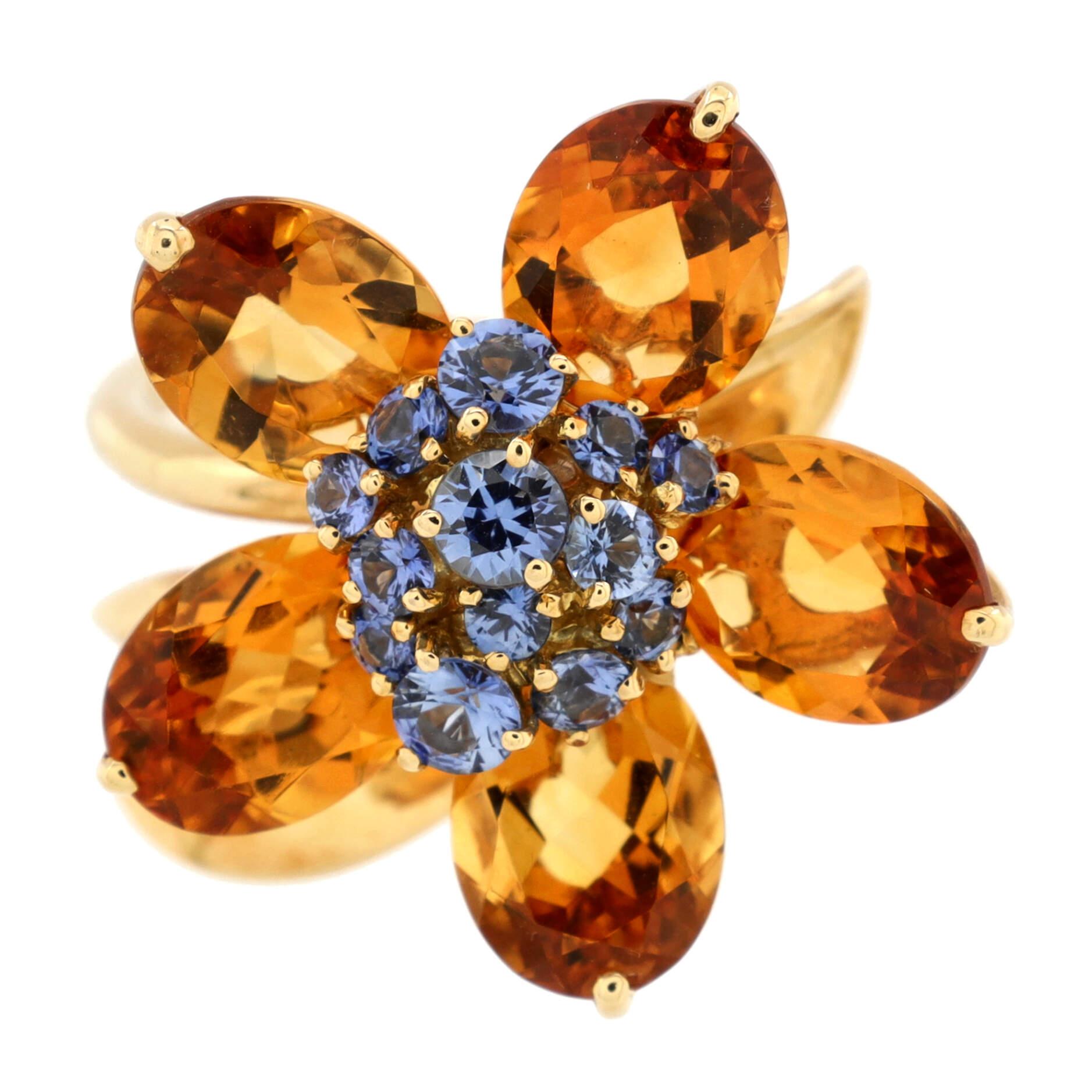 Condition: Great. Minor wear throughout.
Accessories: No Accessories
Measurements: Size: 6.25 - 53, Width: 1.95 mm
Designer: Van Cleef & Arpels
Model: Hawaii Flower Ring 18K Yellow Gold with Citrines and Blue Sapphires
Exterior Color: Yellow
