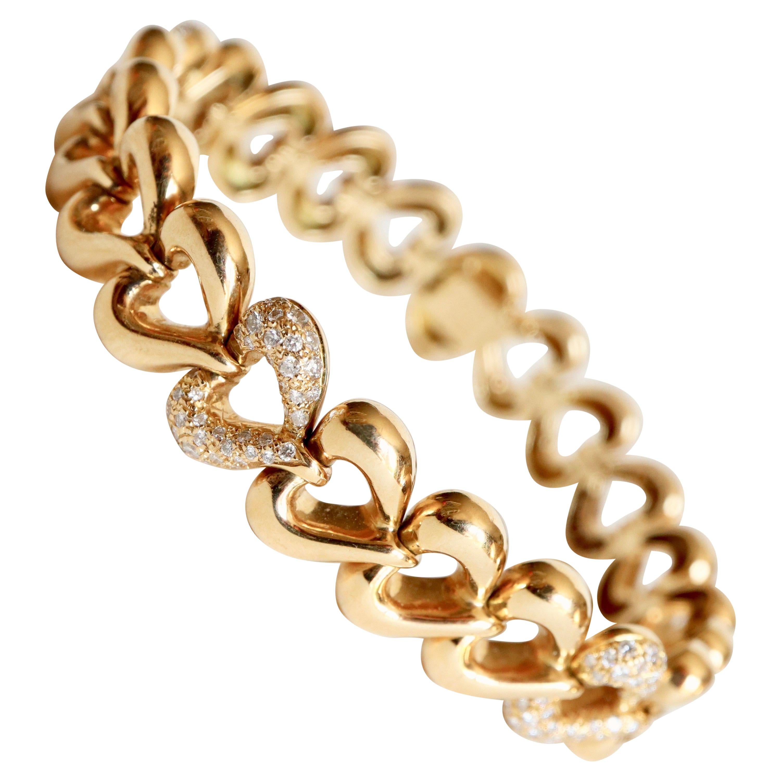 Van Cleef & Arpels Bracelet à maillons en forme de cœur en or 18 carats et diamants en vente