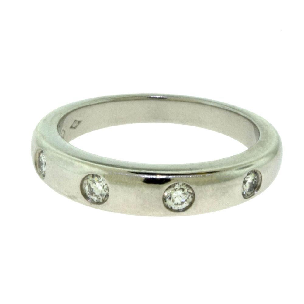 Van Cleef & Arpels Infini Etoile 4 Diamond Platinum Ring In Good Condition In Miami, FL