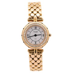 Van Cleef & Arpels La Collection Montre pour femme en or 18 carats avec lunette en diamants