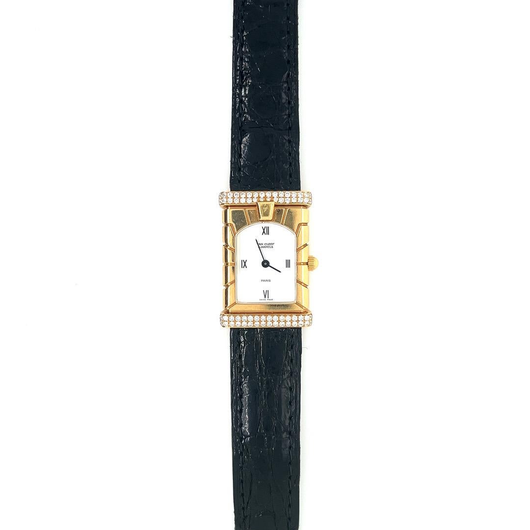 Van Cleef & Arpels Façade 18K Yellow Gold Pave Diamond Wrist Watch

Façade collection 
Watch weighs 29g (including crocodile strap)
Case measures appx 30mm x 19mm (21.5mm with crown)
Dial is color white
Roman Numerals 
40 round pave diamonds, total