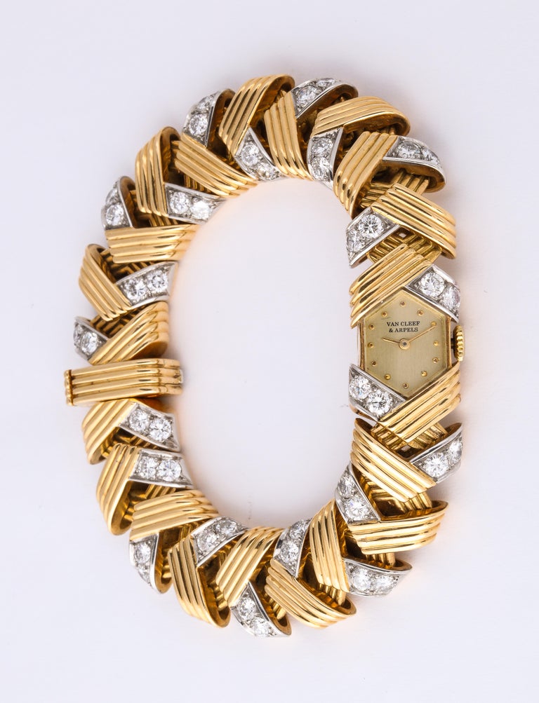 The discreet design of this piece makes it as much a bracelet as it is a watch.  Beautiful and useful!  The ribbed gold design, combined with the whitest diamonds is quintessentially V.C.A. and clearly reflective of the 1970's.  Classic, stylish and