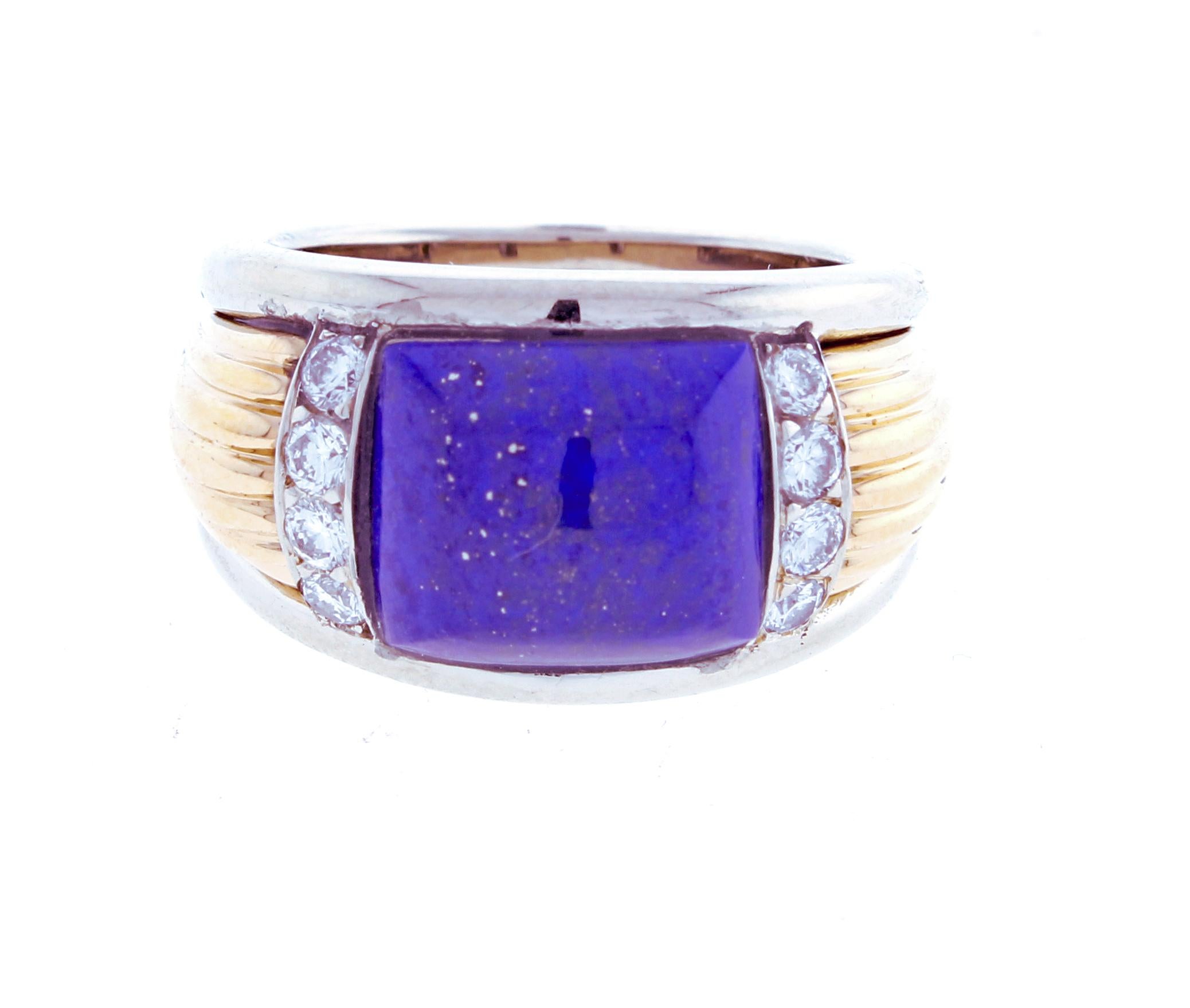  From Van Cleef & Arpels a  lapis and diamond  ring. The  white and yellow 18 karat gold features 8 diamonds weighing approximately  .16 carats. Lapis 9. x 10mm, overall ring width 12.5mm, size 6.  Signed Van Cleef & Arpels #B5486  French quality