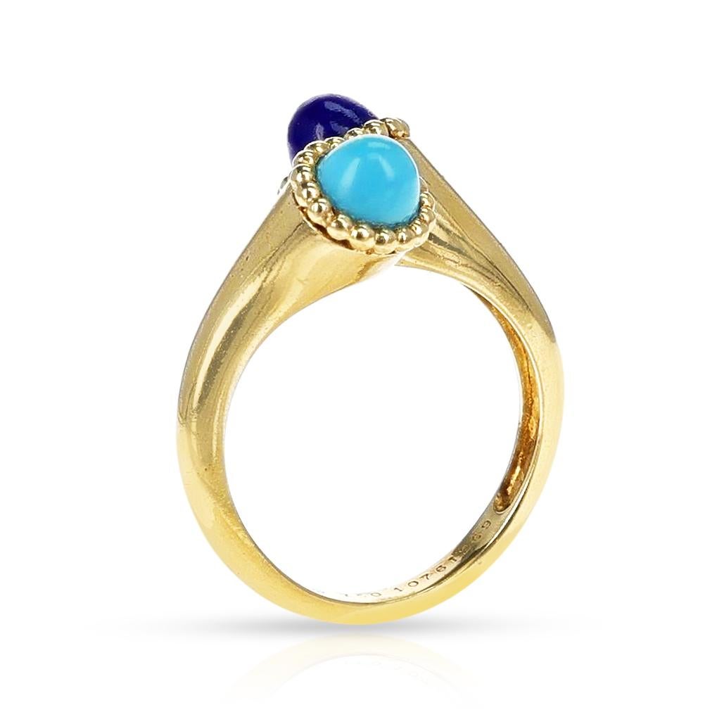 A Van Cleef & Arpels Lapis and Turquoise Bypass Ring, 18k. The total weight of the ring is 5.27 grams. The ring size is US 5.75. 