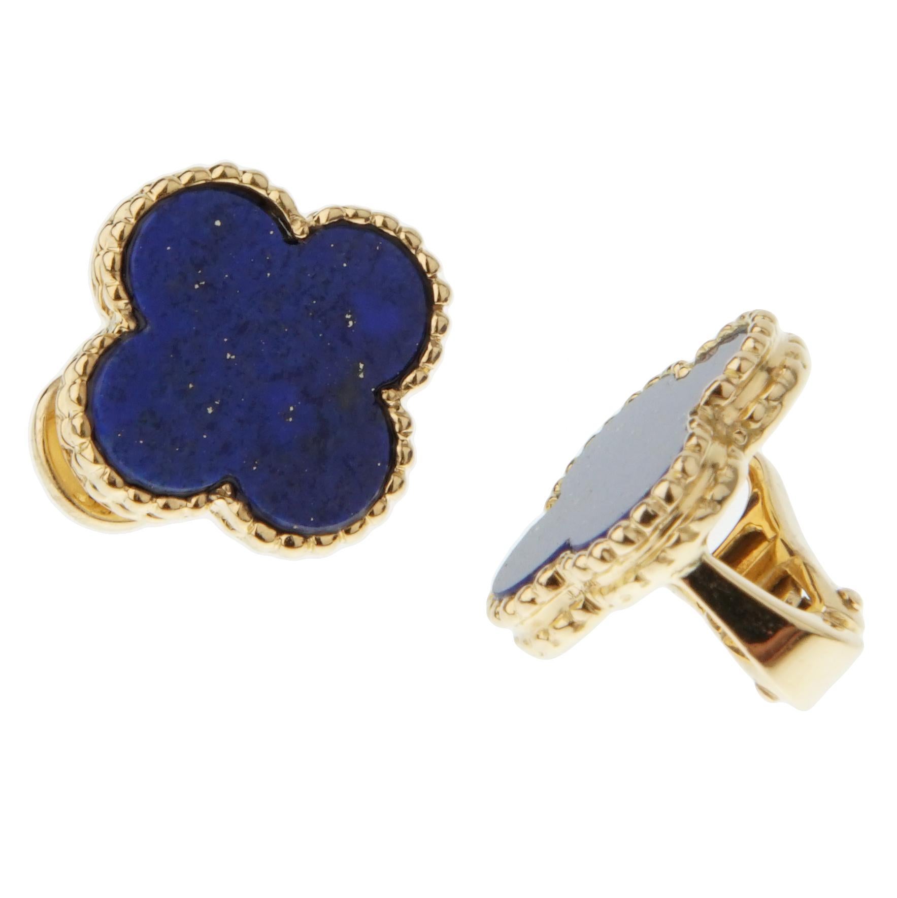 An incredibly rare set of vintage alhambra earrings by Van Cleef & Arpels showcasing 2 wonderful lapis stones set in the iconic alhambra motif in 18k yellow gold.