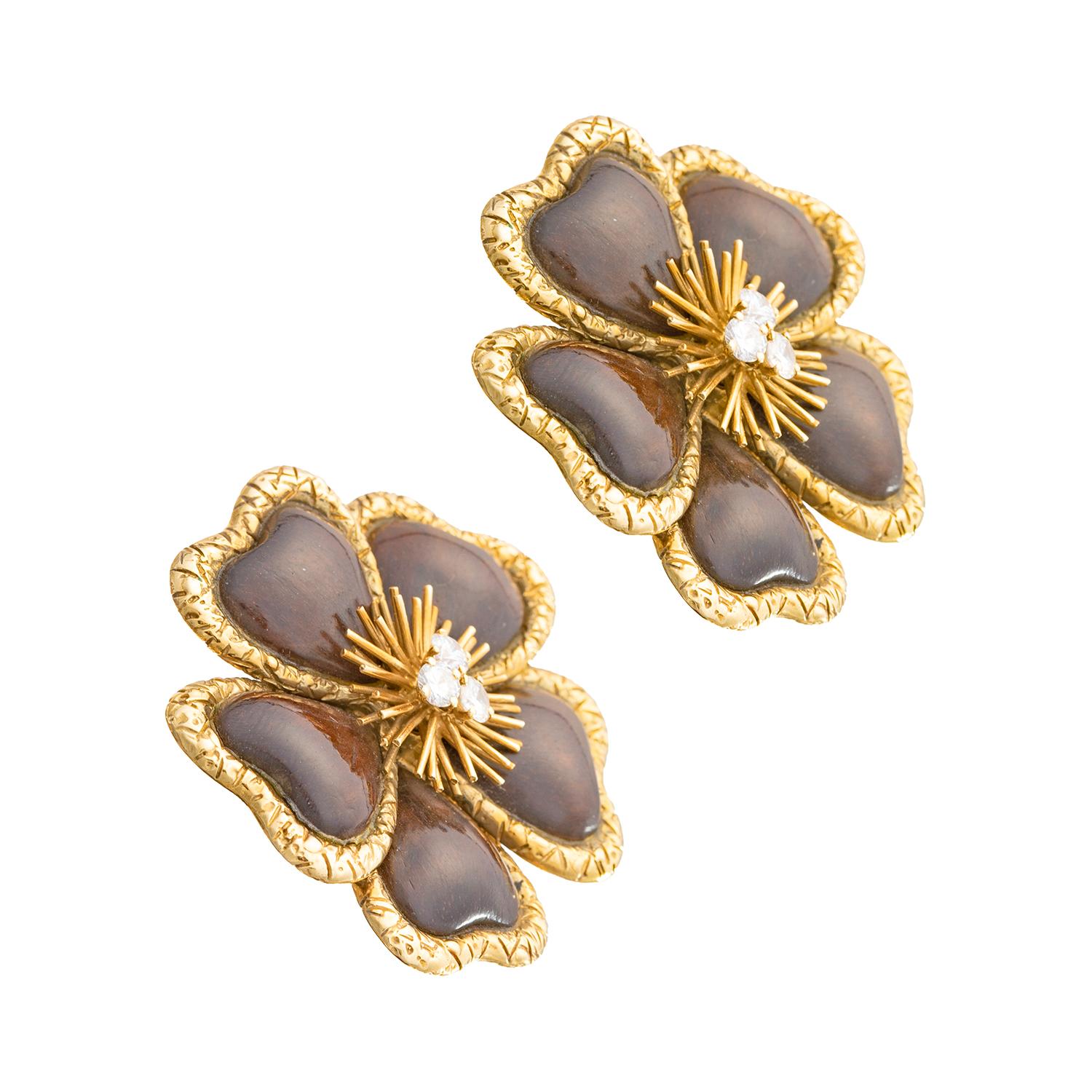 Van Cleef & Arpels large clematis flower clip earrings, each flowerhead centering three round brilliant-cut diamonds within a gold wire spray surrounded by five carved wood petals within hammered 18k yellow gold frames.  Signed 