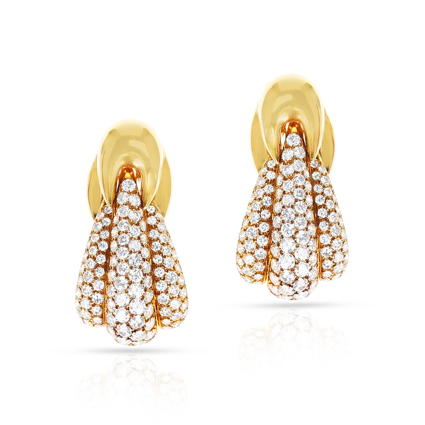 A magnificent pair of Van Cleef & Arpels Large Cocktail Diamond Earrings made in 18 karat Yellow Gold. Length 1.60 inches. The total weight is 28.79 grams. Signed and numbered.