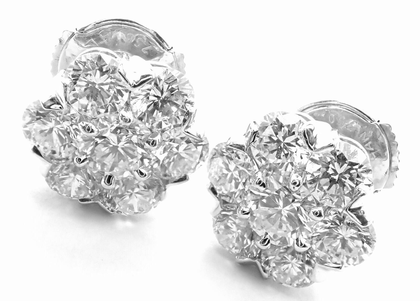 18k White Gold Diamond Large Fleurette Flower Earrings by Van Cleef & Arpels. 
With 14 round brilliant cut diamonds VVS1 clarity, E color total weight approx. 1.88ct
These earrings come with Van Cleef & Arpels box.
***These earrings are for pierced