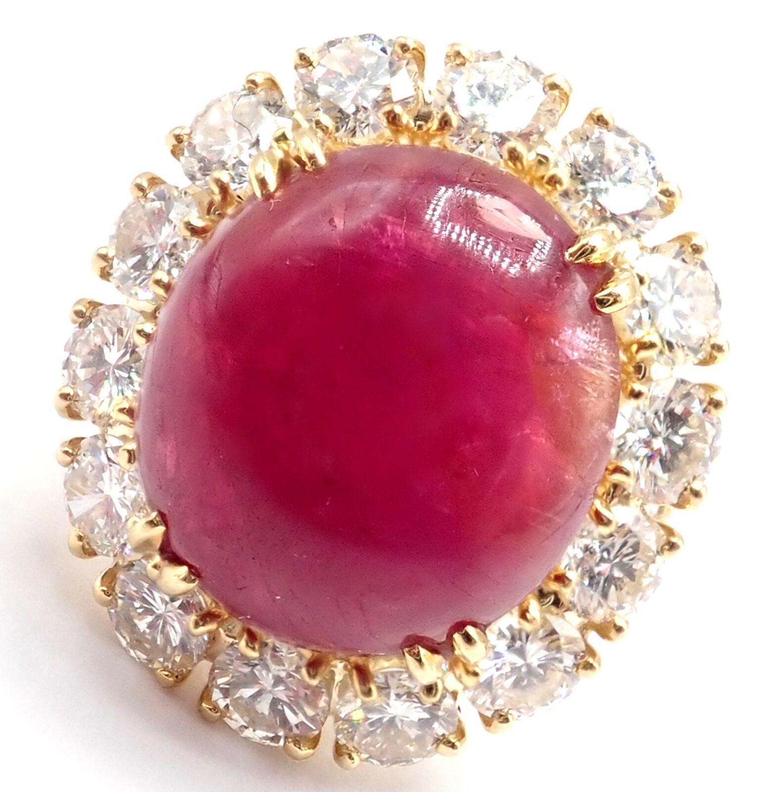 18k Yellow Gold Large 11ct Cabochon Ruby and Diamond Ring by Van Cleef & Arpels. 
With 20 round brilliant cut diamonds, VVS1 Clarity, E Color. Total Diamond Weight approximately 3ct
Oval Cabochon Run total weight approximately 11ct
Details: 
Ring