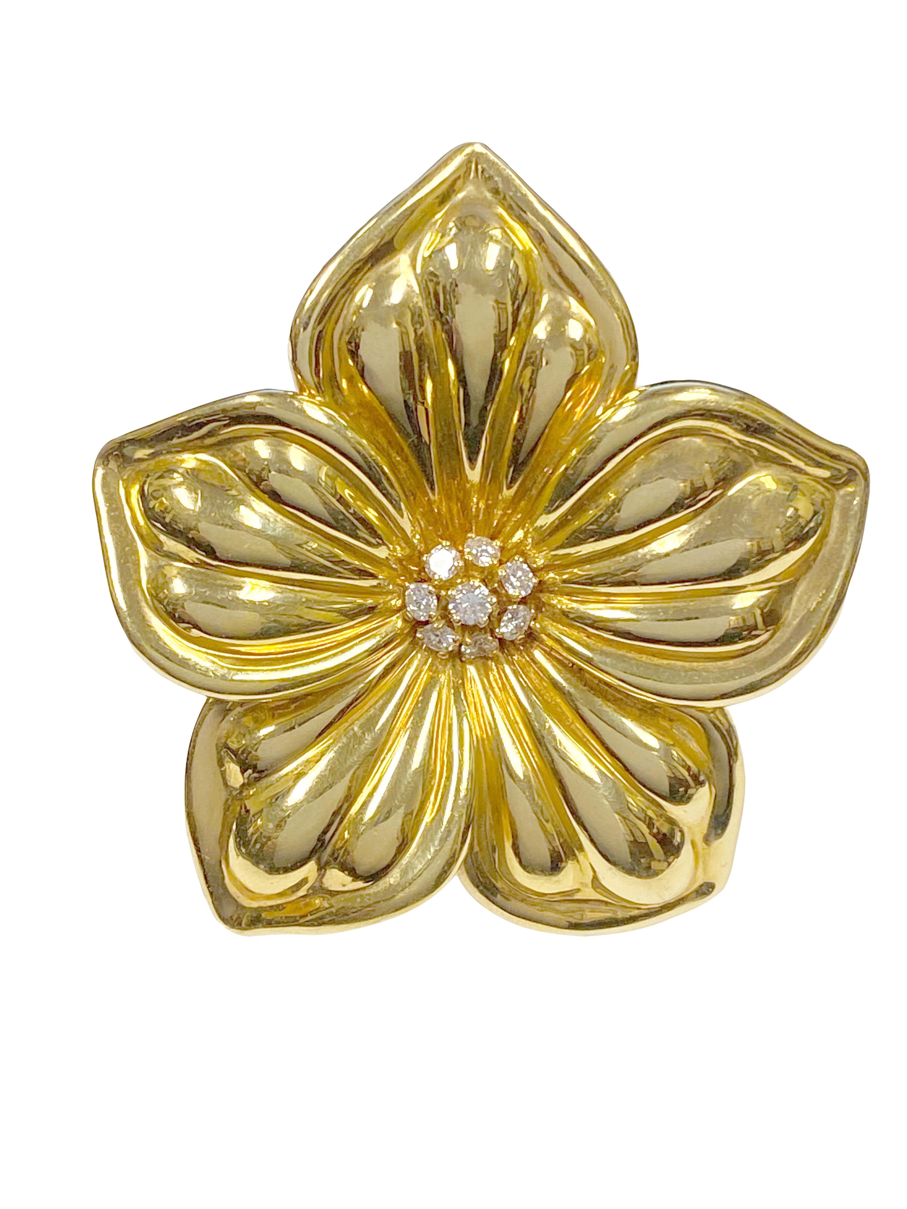 Circa 2000 Van Cleef & Arpels 18K yellow Gold Magnolia Flower Brooch, measuring 2 1/2 inches in diameter and centrally set with with Round Brilliant cut Diamonds totaling .45 Carat. Comes in a VCA suede pouch.