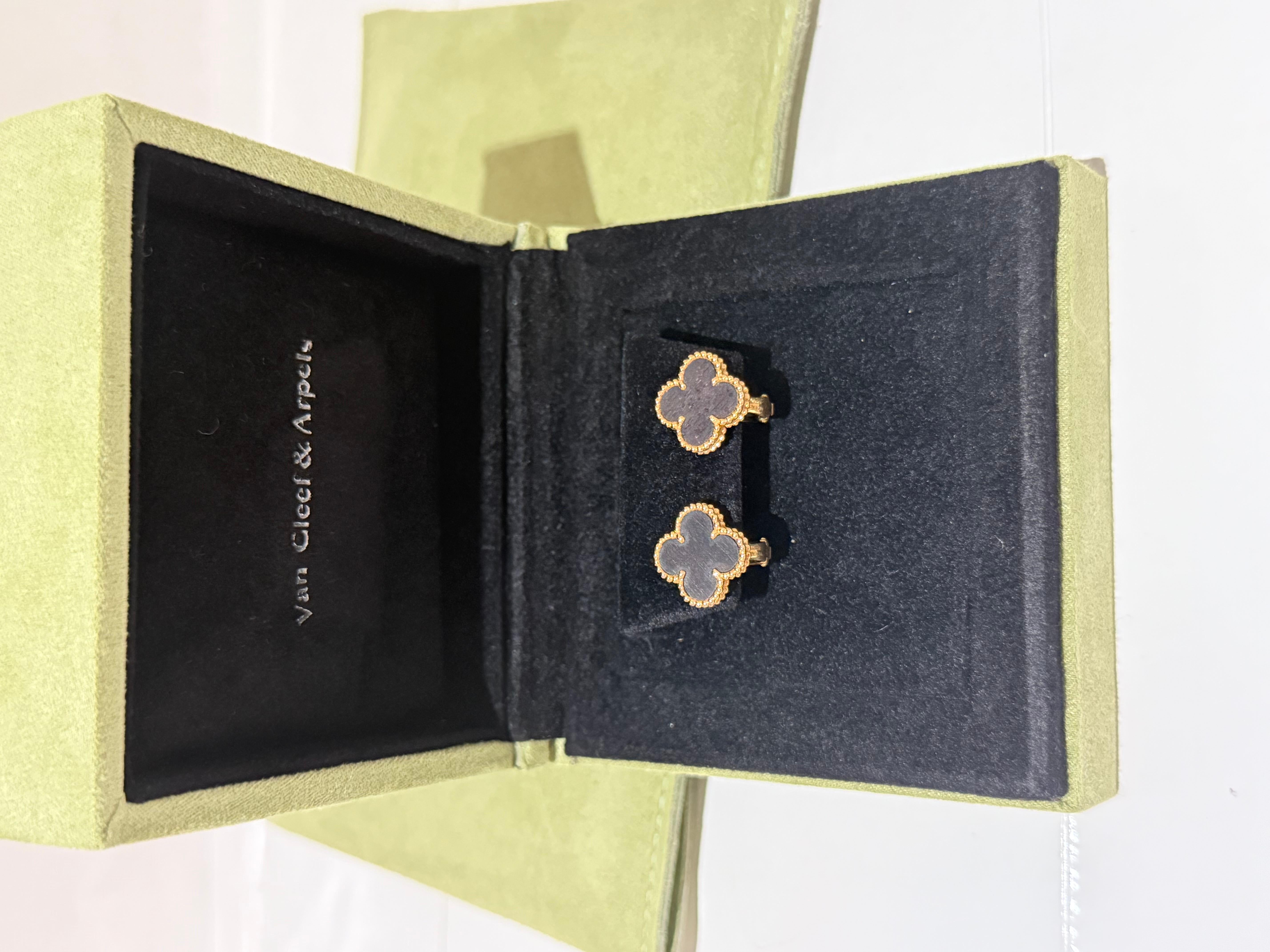 Van Cleef and Arpels 18K Rose Gold Letterwood Vintage Alhambra Earrings. Limited edition and numbered piece. Very rare for collectors. 
These earrings are crafted of 18 karat rose gold and feature the Alhambra clover motif set with South American