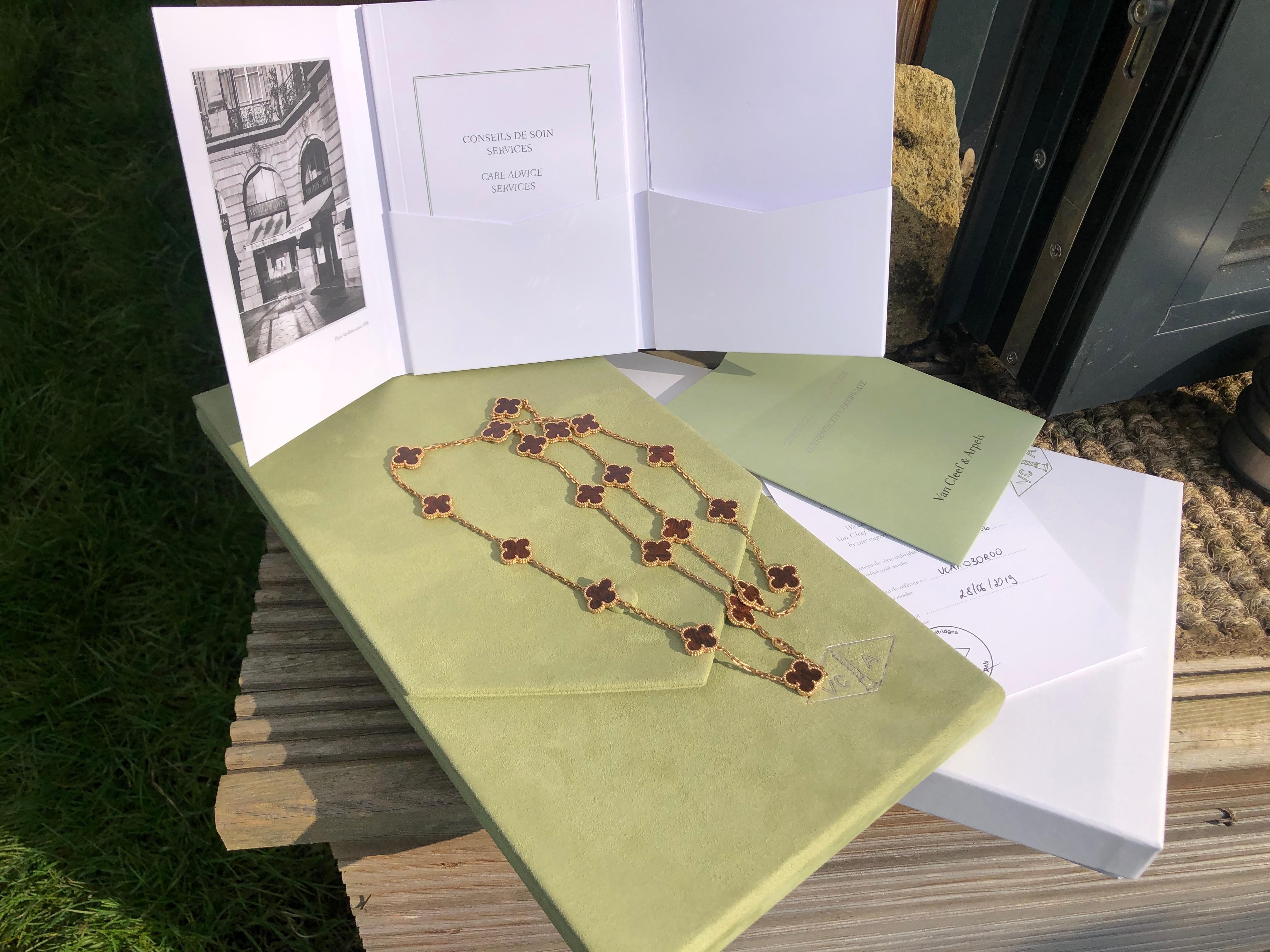 Gorgeous authentic rare and highly collectible Van Cleef & Arpels Vintage Alhambra letter wood 20 Motif necklace. This piece comes with an original pouch original box and authentic card. 

STONES
Letter wood

METAL TYPE 
18K Rose