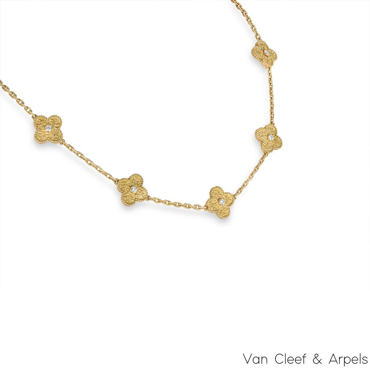 A limited edition 18k yellow gold diamond necklace by Van Cleef & Arpels from the Vintage Alhambra collection. The necklace has 10 motifs, each set with a textured pattern, a bezel set round brilliant cut diamond and complemented by a beaded outer
