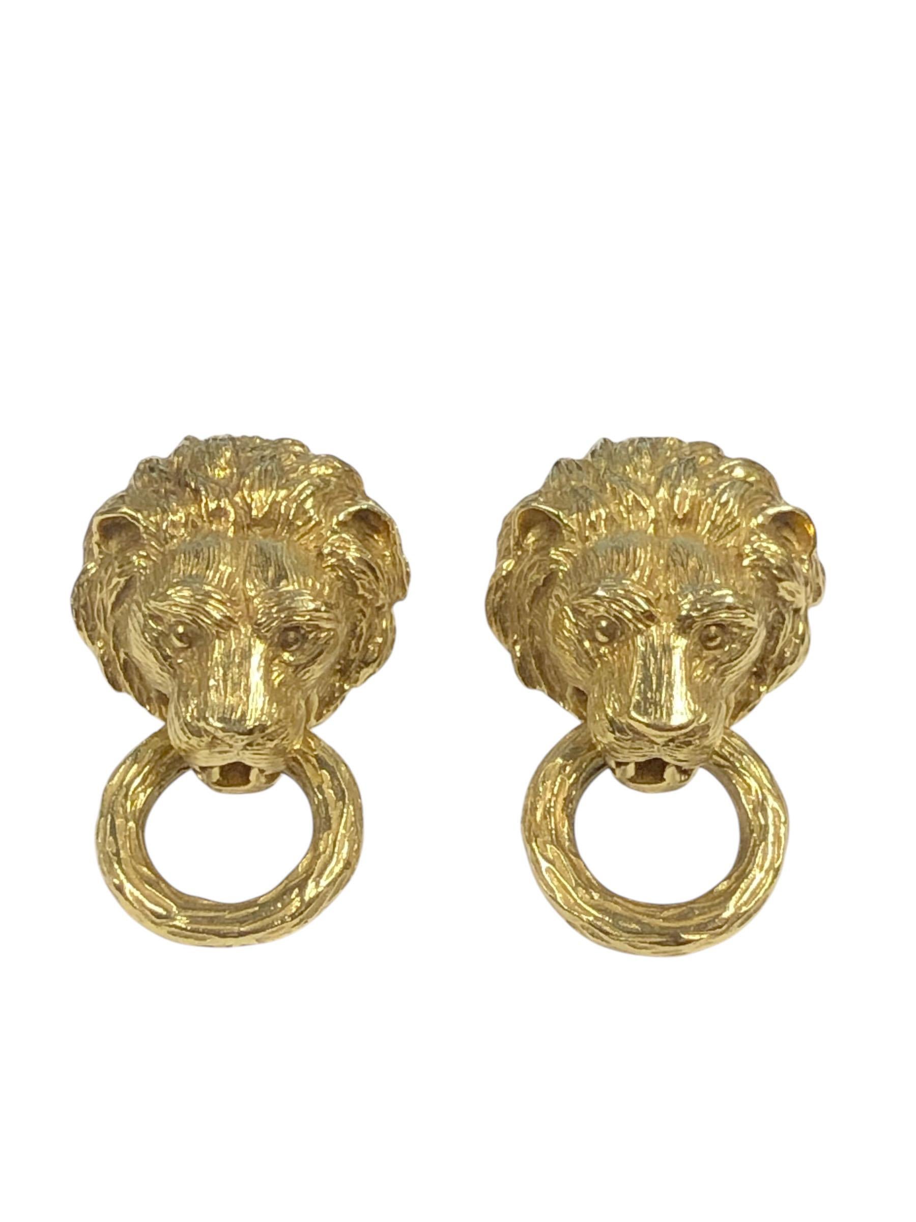 Circa 1970s Van Cleef & Arpels  18k Yellow Gold Door Knocker, Lion Motif Earrings,  measuring 1 1/2 inches in length, 1 inch wide and weighing 34.2 Grams. Nice solid construction with hand chased finishing and detail.  Original Van Cleef