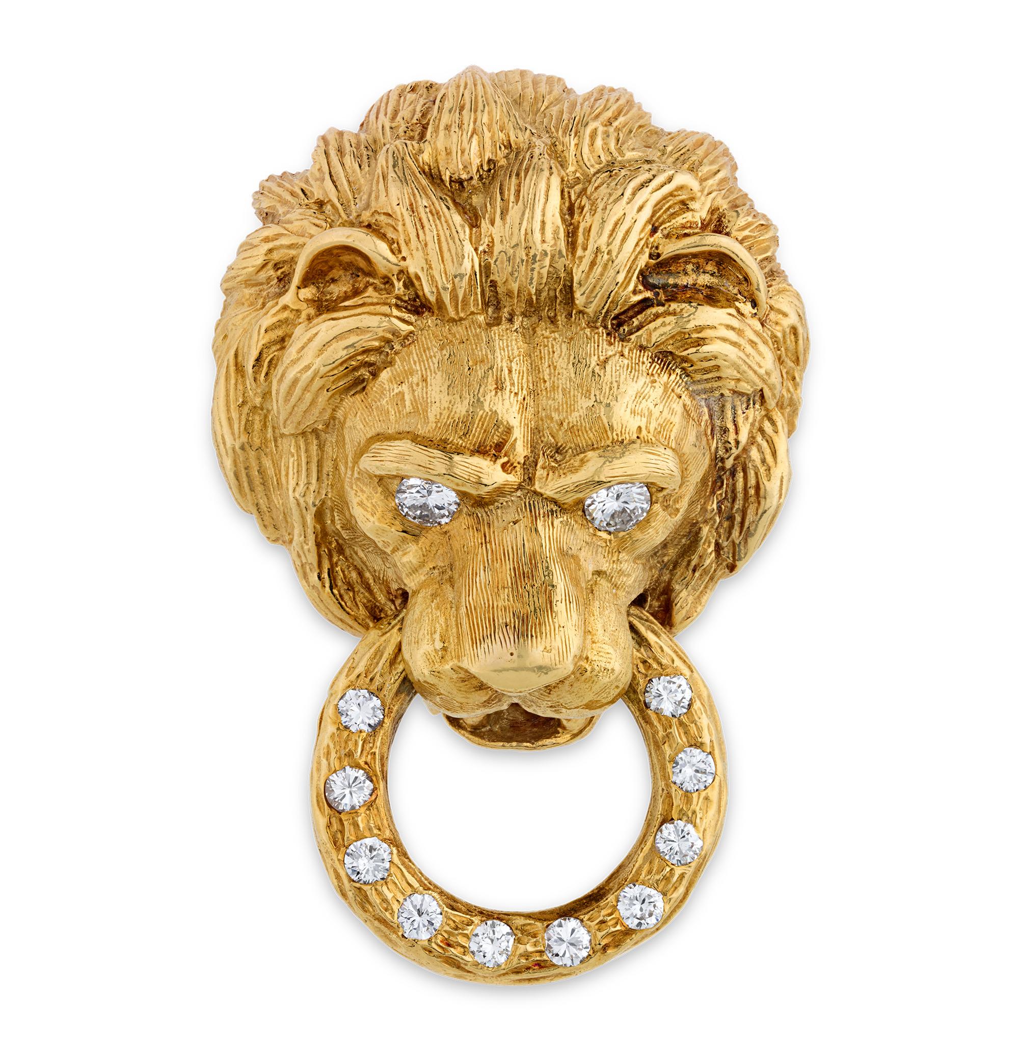 Exuding both power and elegance, this striking earring and brooch set by Van Cleef & Arpels features intricately crafted lion heads in 18K yellow gold, symbolizing strength and regality. The earrings and matching brooch, styled as door knockers, are