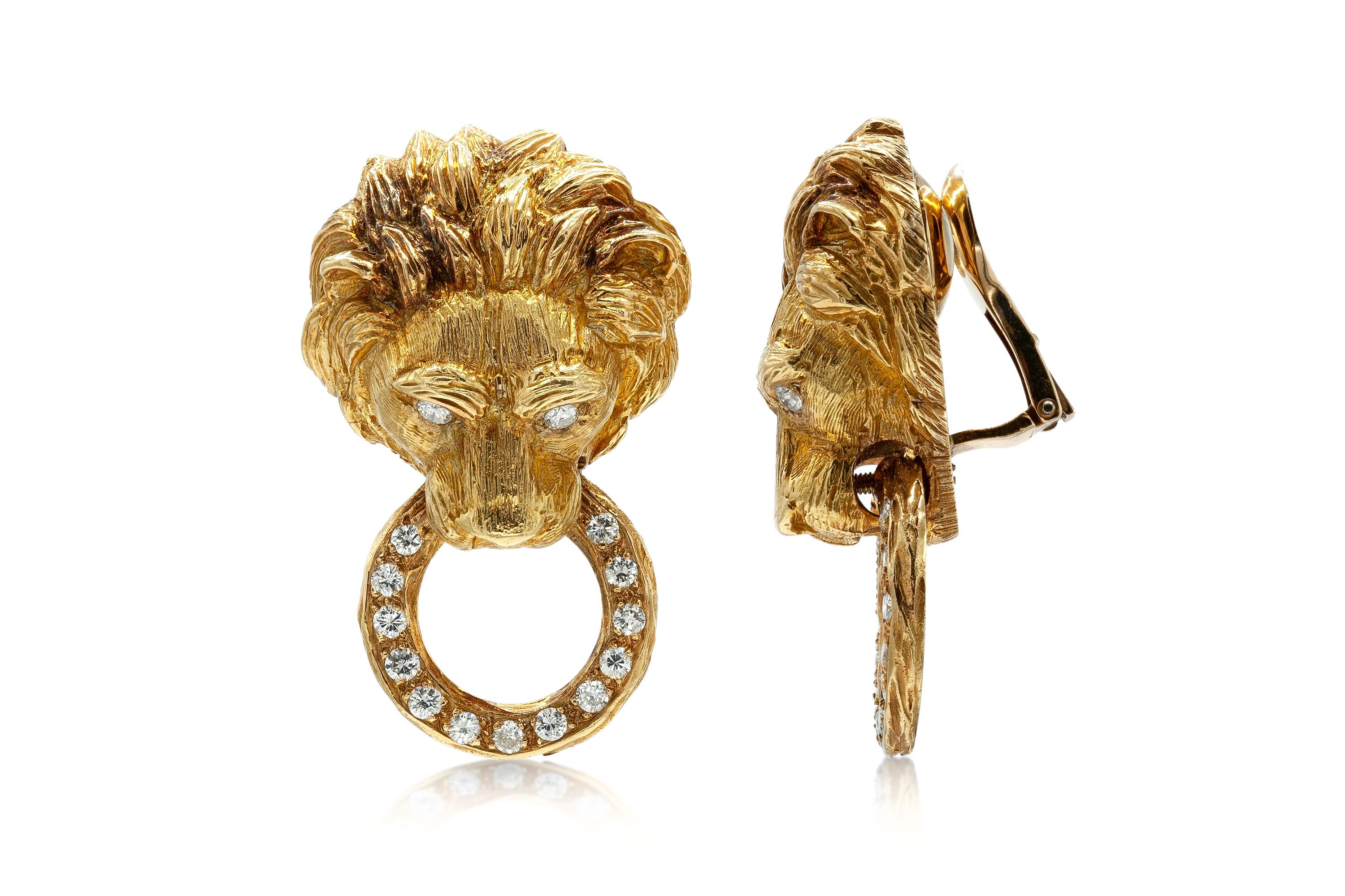 Finely crafted in 18K yellow gold featuring round-brilliant cut diamonds weighing approximately 1.20 carats total. 
Circa 1970s.
1 3/4 inch (from top of lion's head to bottom of ring) x 1 inch (widest point of lion's head).
41.7 grams. 
Signed and