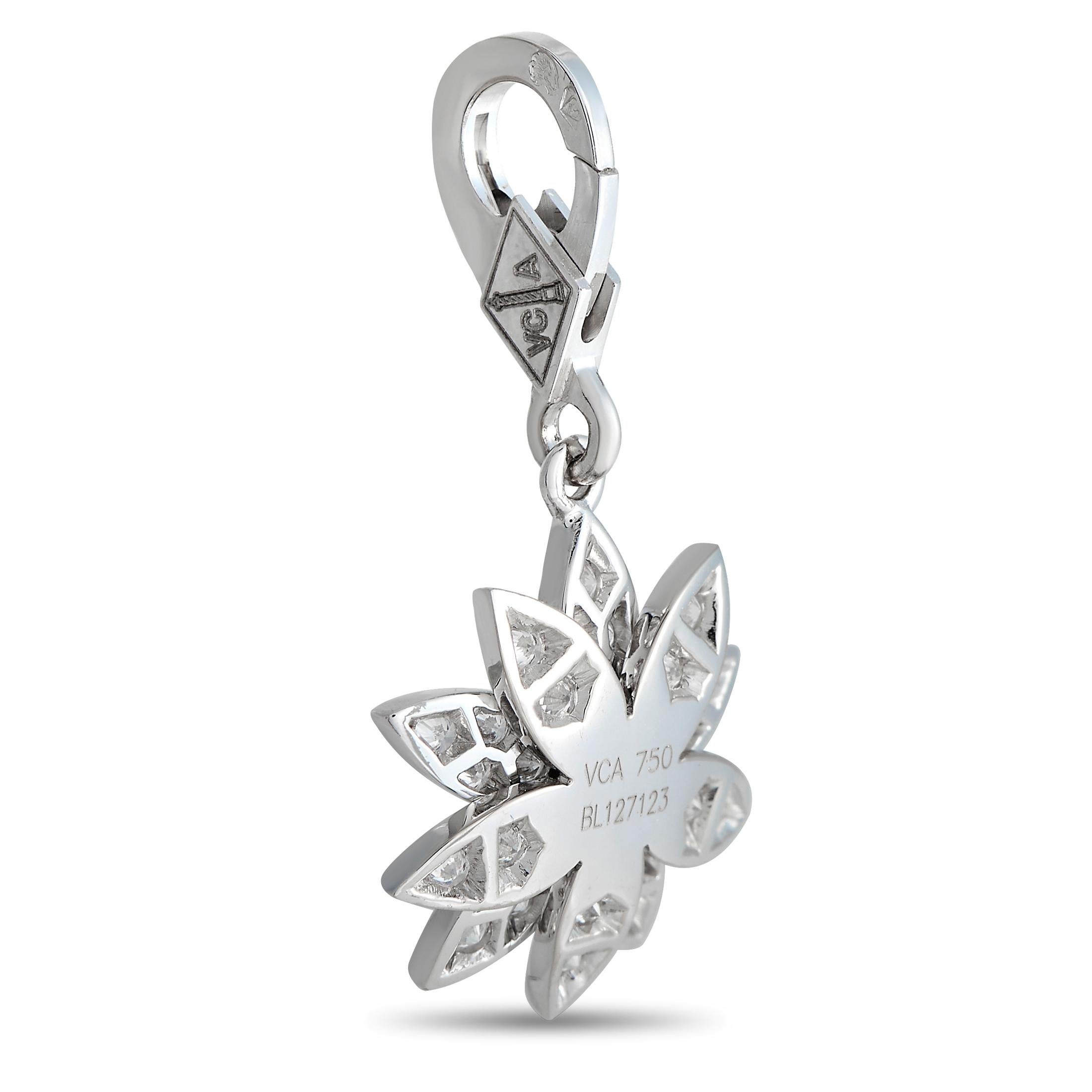 Be reminded of your beauty and inner strength by carrying this sparkling charm from Van Cleef & Arpels' Lotus Collection. It features a sculpted lotus in white gold with petals covered with brilliant diamonds. The lotus charm has a VCA-stamped and