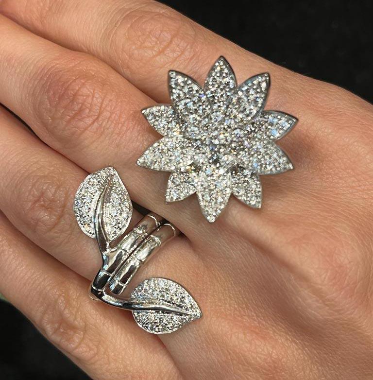 Modern Van Cleef & Arpels Diamond Lotus Between the Finger Ring set in 18k White Gold