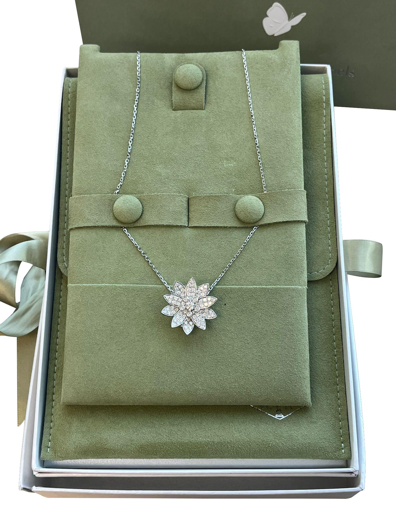 Van Cleef & Arpels Lotus Clip Pendant Medium Model In 18K White Gold In New Condition For Sale In Aventura, FL