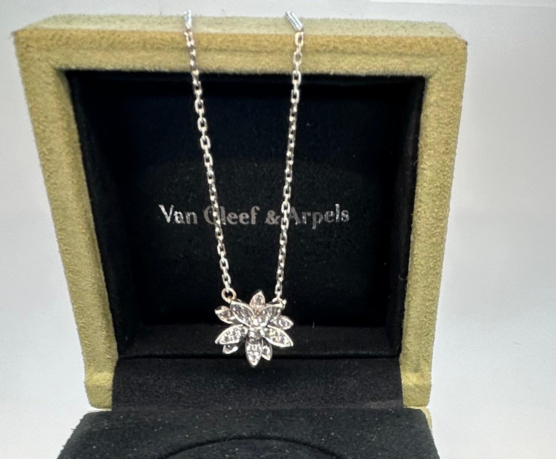 Van Cleef & Arpels Lotus Pendant small model 18k WG diamond necklace, marked VCA 750 JB126449, 5.0g