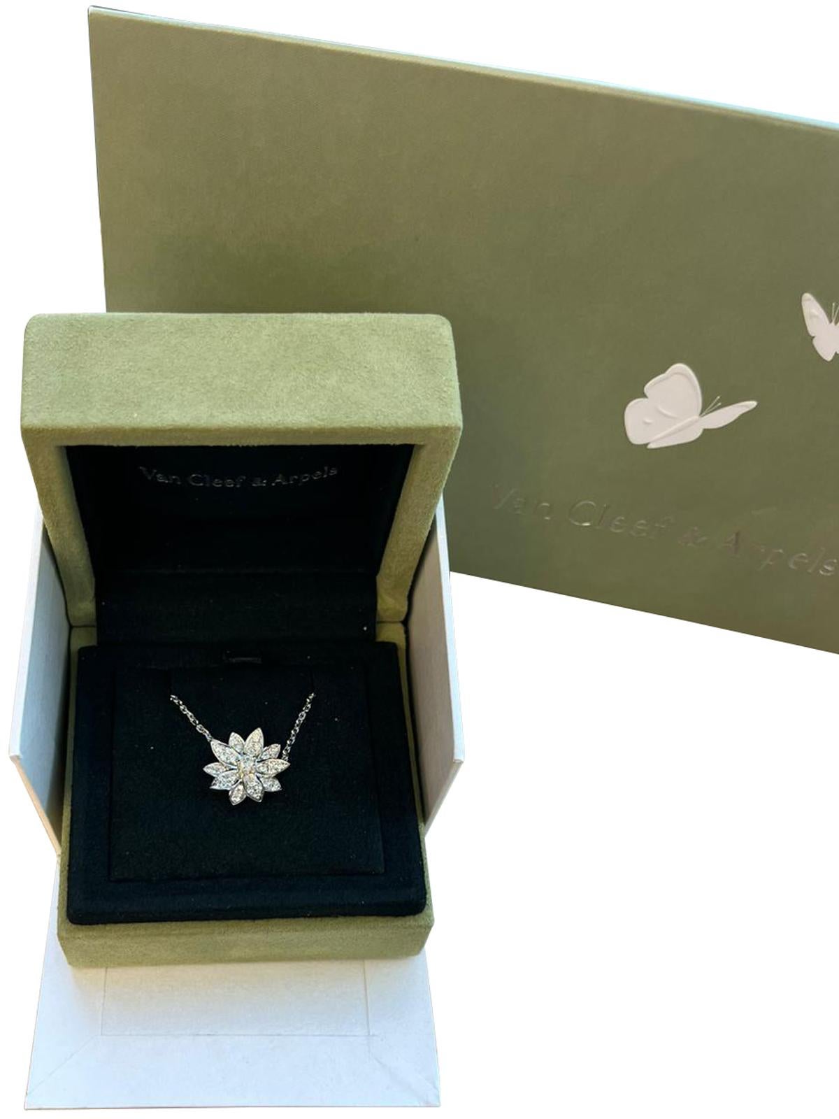 Van Cleef & Arpels Lotus Pendant Small Model In 18K White Gold In New Condition For Sale In Aventura, FL