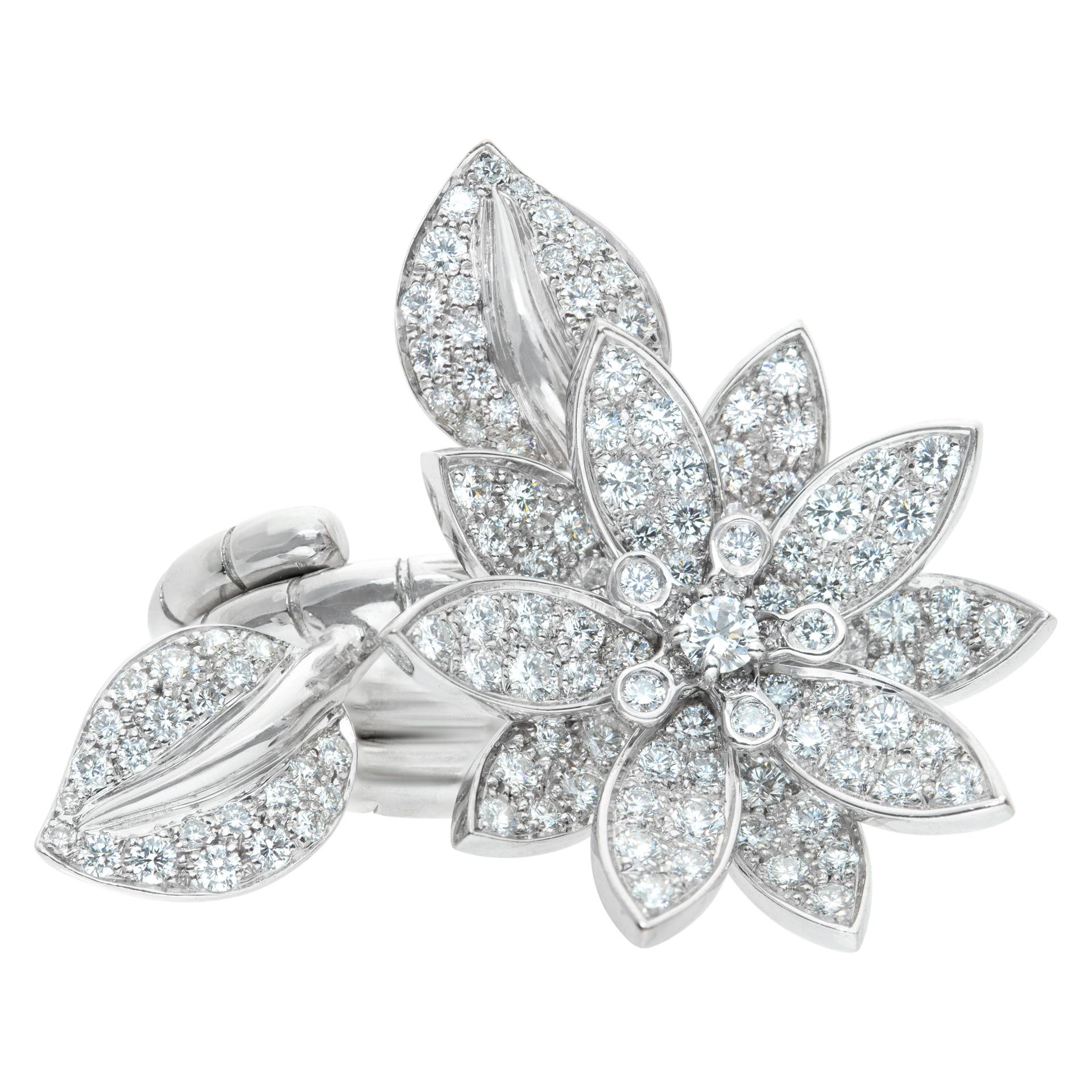 Van Cleef & Arpels Lotus Between the Finger ring in 18k white gold with approximately 2.15 carats in D,E,F color, IF - VVS clarity diamonds. Size 6.25.