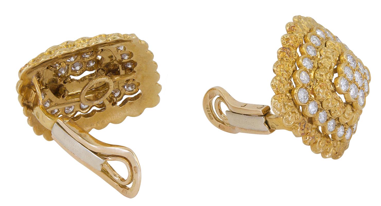 Van Cleef & Arpels Paris Vintage Collection Lozenge Motifs Diamond Gold Earrings
A pair of 18k yellow gold textured gold lozenge motif ear clips, set with round diamonds.
Diamond weight approx. 3.06 carats total G VS clarity. Measures approx. 1.25″