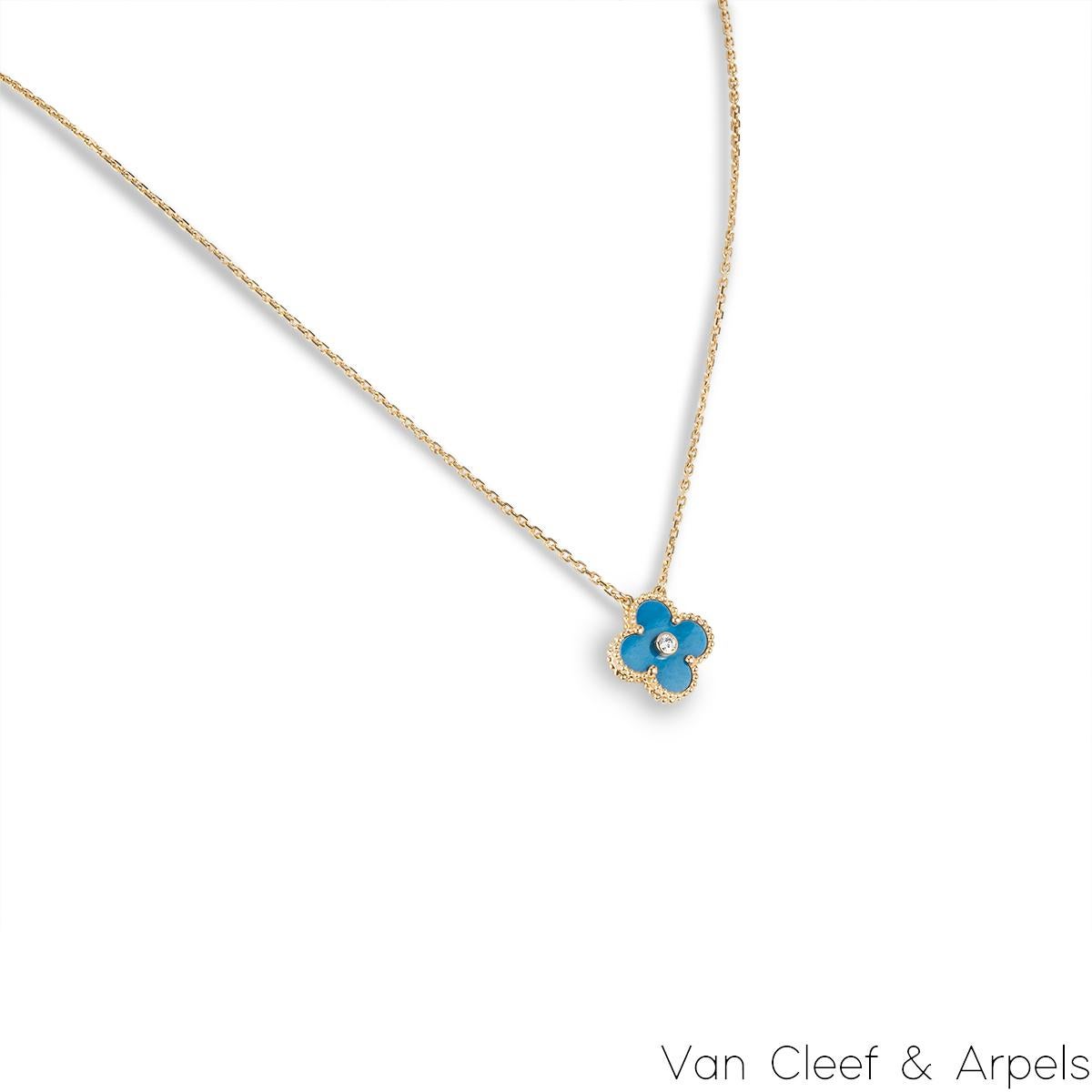 A limited edition 18k yellow gold Celestial Blue porcelain Van Cleef & Arpels Vintage Alhambra pendant from the 2019 Holiday collection. The pendant features a beaded edge 4 leaf clover motif with a Celestial Bleu de Sèvres porcelain inlay. Van