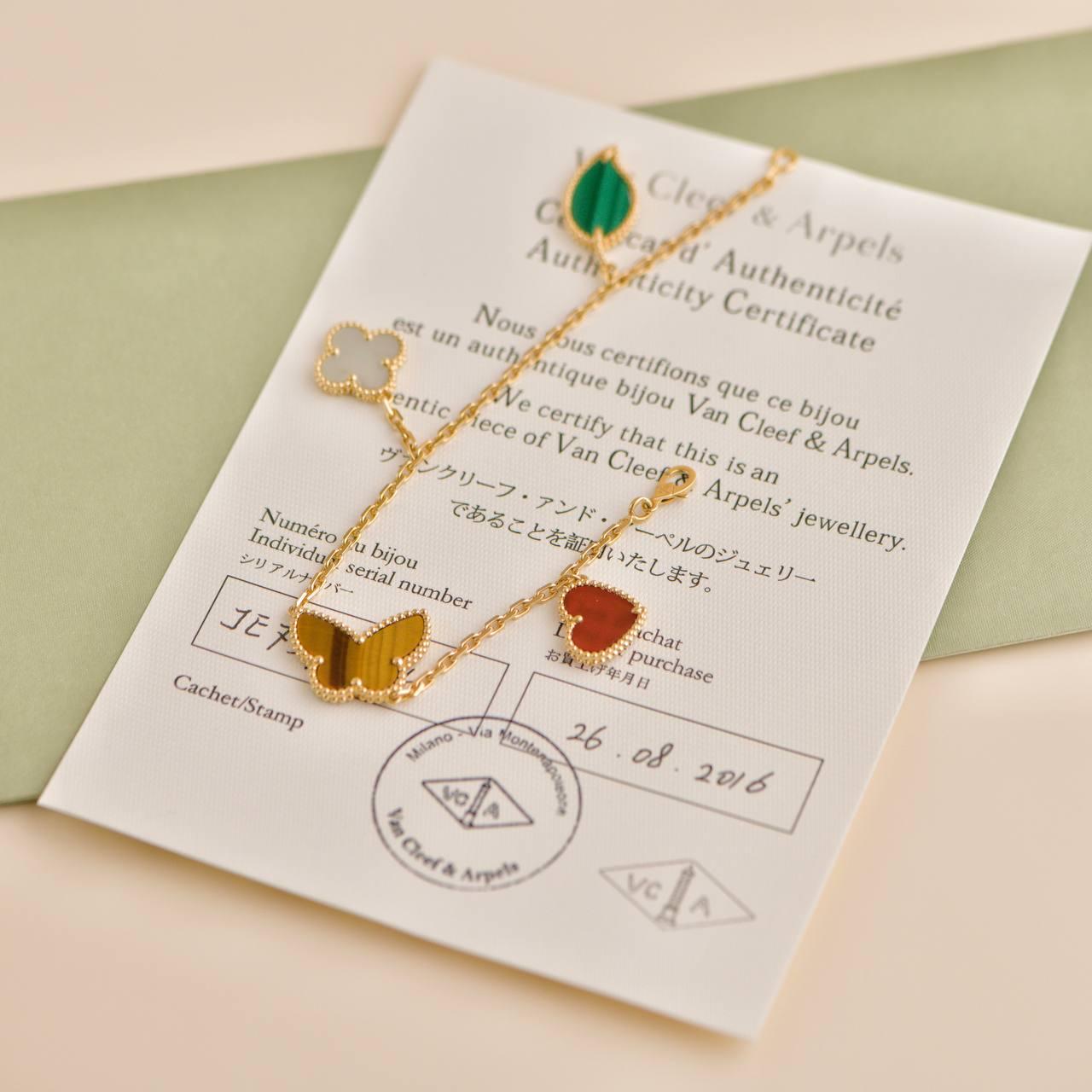 Van Cleef & Arpels Lucky Alhambra 4 Motif Yellow Gold Bracelet In Excellent Condition In Banbury, GB