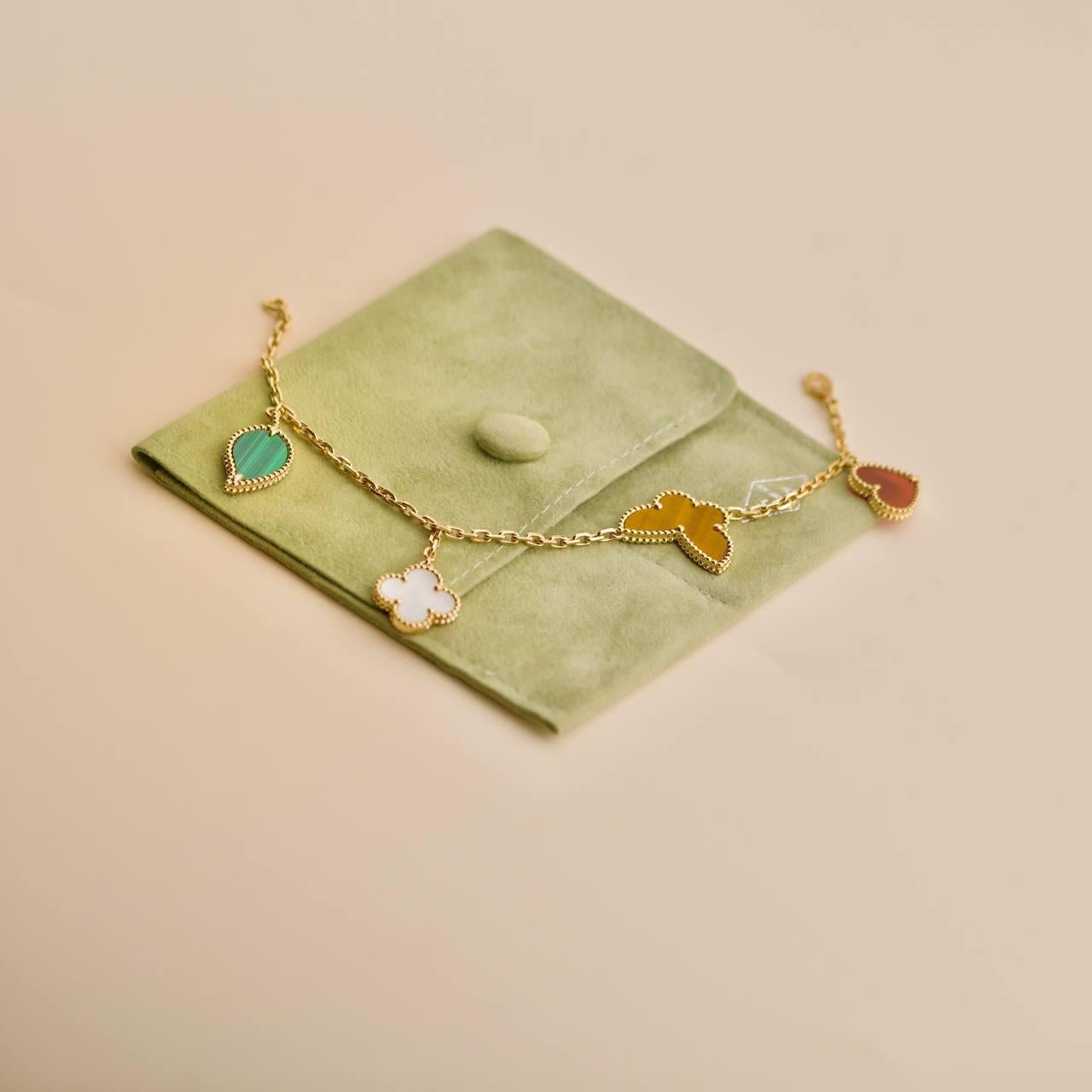 Van Cleef & Arpels Lucky Alhambra 4 Motifs 18K Yellow Gold Bracelet In Excellent Condition For Sale In Banbury, GB