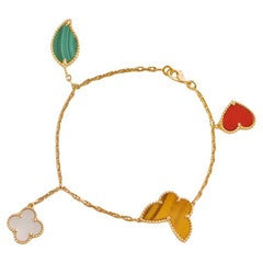 Van Cleef & Arpels Lucky Alhambra, bracelet en or jaune 18 carats à 4 motifs