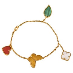 Van Cleef & Arpels Lucky Alhambra Armband aus 18 Karat Gelbgold mit 4 Motiven