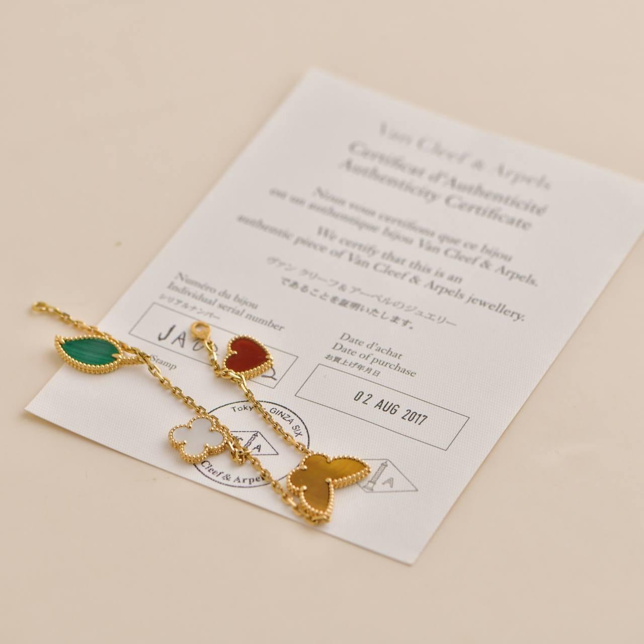 Van Cleef & Arpels Lucky Alhambra Armband aus Gelbgold mit 4 Motiven für Damen oder Herren