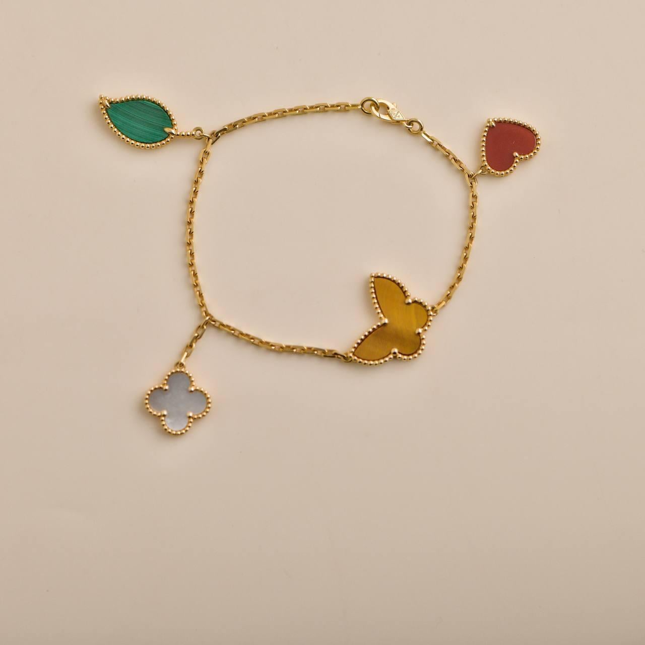 Van Cleef & Arpels Bracelet Lucky Alhambra en or jaune à 4 motifs 2