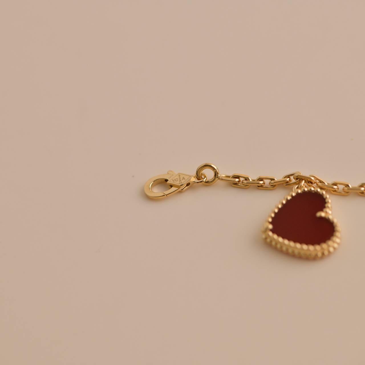 Van Cleef & Arpels Lucky Alhambra Armband aus Gelbgold mit 4 Motiven 4