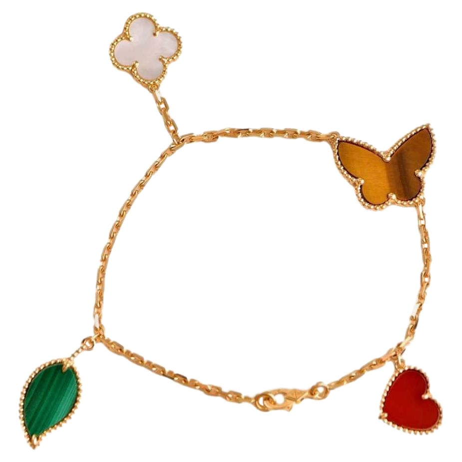 Van Cleef & Arpels Lucky Alhambra Armband aus Gelbgold mit 4 Motiven