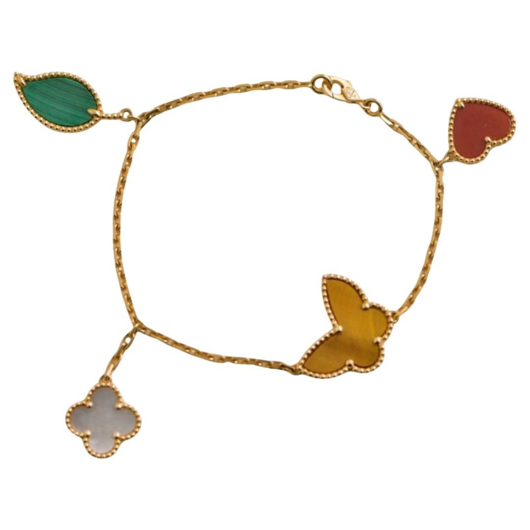 Van Cleef & Arpels Lucky Alhambra Armband aus Gelbgold mit 4 Motiven