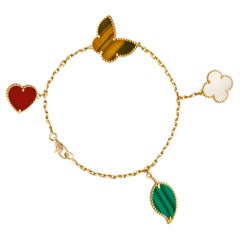 Van Cleef & Arpels Lucky Alhambra Bracelet With Four Motifs Set in 18K Gold