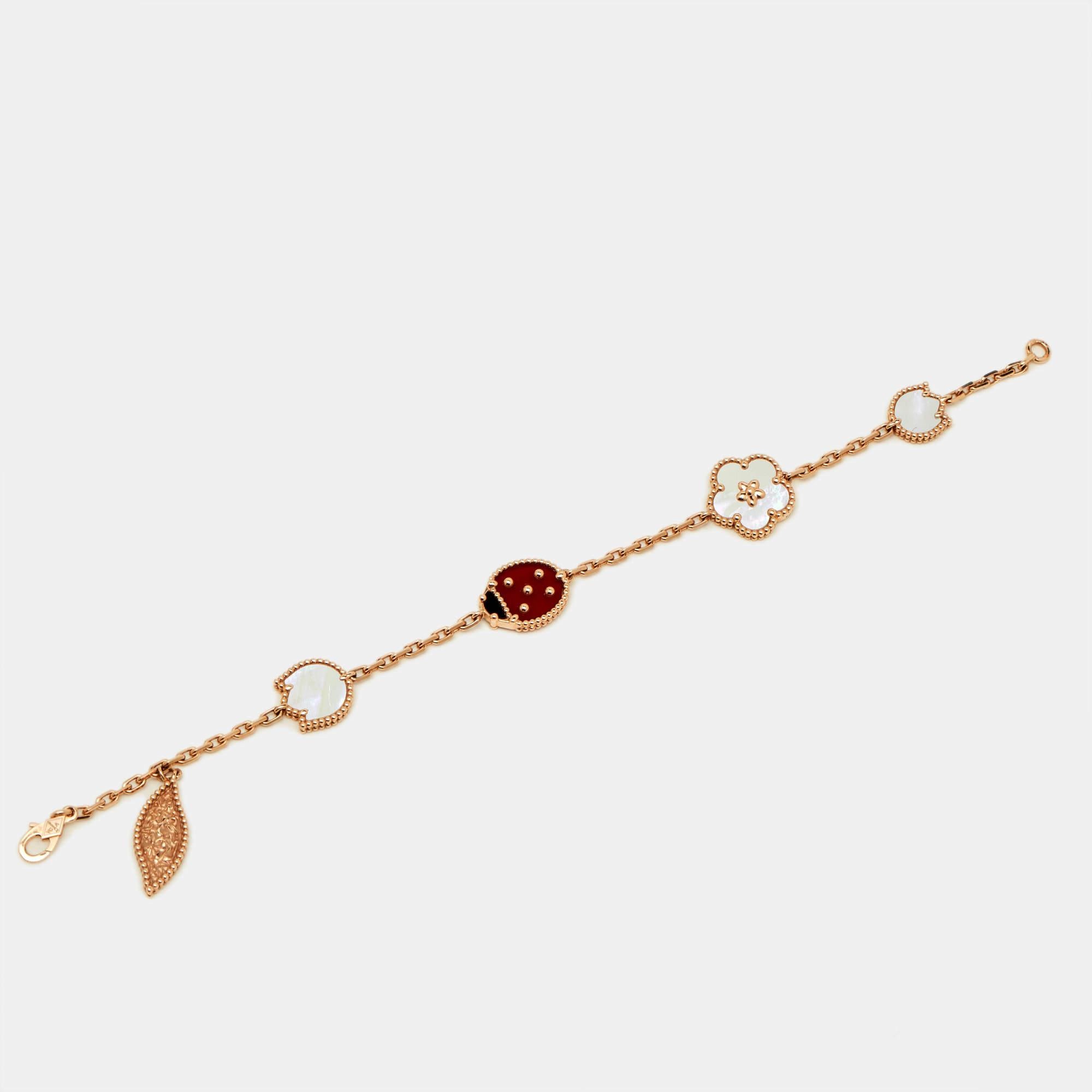 Add the magic of Van Cleef & Arpels to the way you accessorize with this bracelet. This 18k rose gold bracelet is styled with fine lines and mesmerizing gemstone work. Complete with signature details, it is sure to add the charm of luxury to your