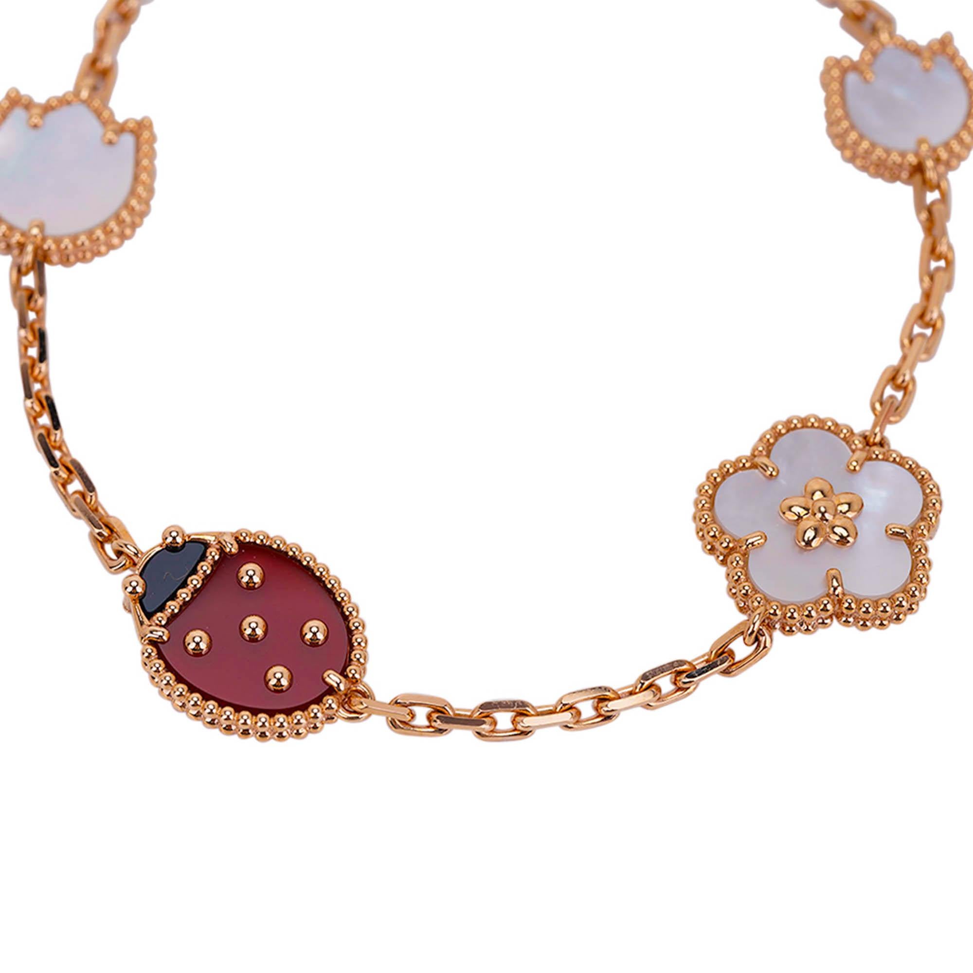 Mightychic offers the collectible Van Cleef & Arpels Lucky Spring long 15 Motifs bracelet.
Happy ladybug, flowers and leaf motifs features the Beauty and Hope of Spring.
Set in 18K Rose Gold with Carnelian, Black Onyx and Mother of Pearl.
Signature