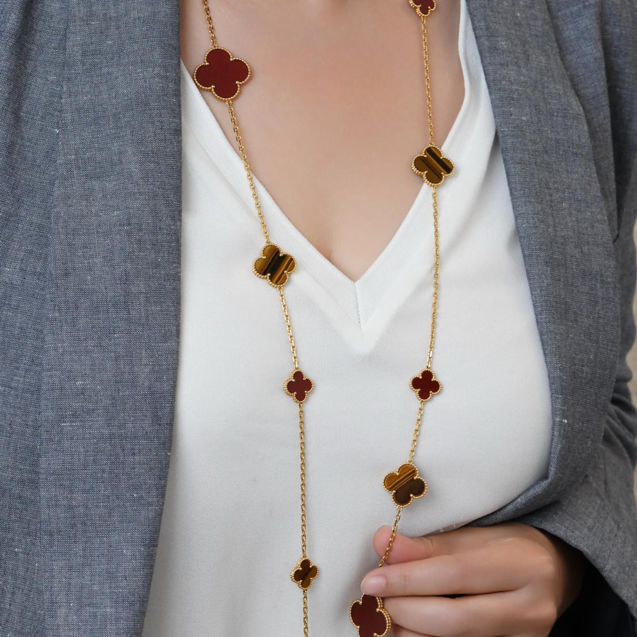 Uncut Van Cleef & Arpels Magic Alhambra 16 Motif Carnelian Tiger's Eye Necklace For Sale